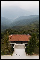 Two people, temple, and misty mountains, Tsen Pagoda. Sun Moon Lake, Taiwan ( color)