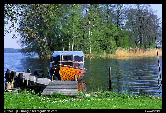 Boat on lakeshore. Central Sweden