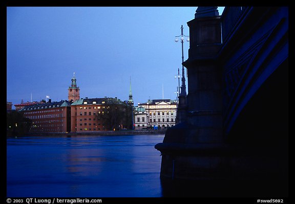 Bridge on Riddarfjarden and Gamla Stan, midnight twilight. Stockholm, Sweden (color)