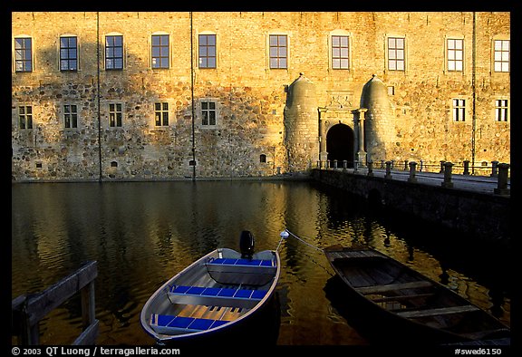 Boat and moat of Vadstena slott. Gotaland, Sweden