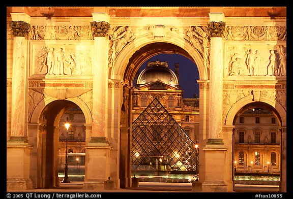 Arche de triomphe du Carousel, Louvre, and Pyramid at night. Paris, France