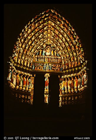 Door of Cathedral laser-illuminated to recreate original colors, Amiens. France