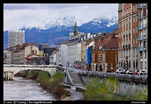 Isere riverbank and snowy mountains. Grenoble, France