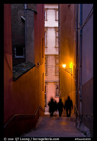 Silhouettes in staircase on Fourviere Hill at dusk. Lyon, France (color)