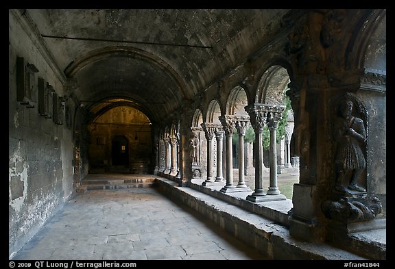 Romanesque gallery with delicately sculptured columns, St Trophimus cloister. Arles, Provence, France