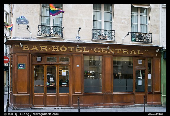 Old Bar hotel and rainbow flag. Paris, France