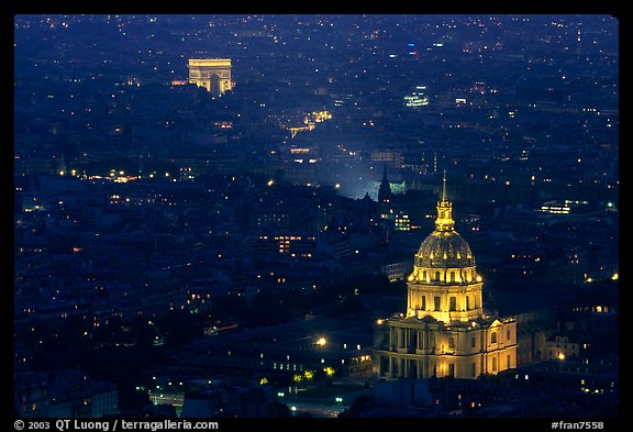 Aerial view of Arc de Triomphe and Invalides by night. Paris, France