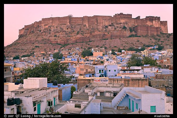 Rooftops and Mehrangarh Fort at dawn. Jodhpur, Rajasthan, India (color)