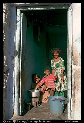 Family inside doorway. Jodhpur, Rajasthan, India