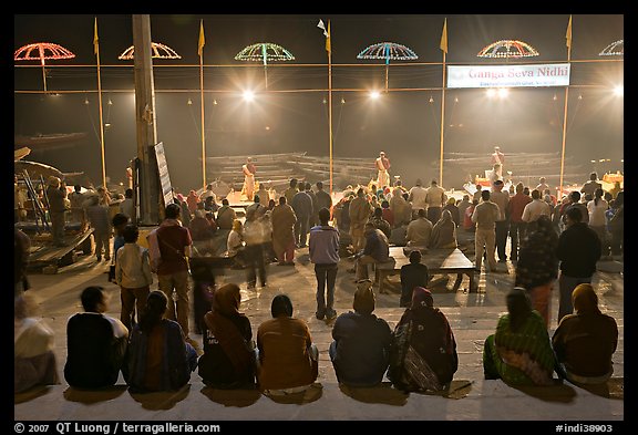 Worshipers attending arti ceremony at Ganga Seva Nidhi. Varanasi, Uttar Pradesh, India (color)
