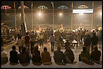Worshipers attending arti ceremony at Ganga Seva Nidhi. Varanasi, Uttar Pradesh, India (color)