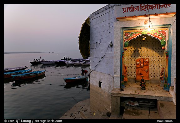 Shrine on the banks of the Ganges River at dawn. Varanasi, Uttar Pradesh, India (color)