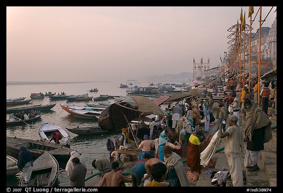Steps of Dasaswamedh Ghat with crowd at sunrise. Varanasi, Uttar Pradesh, India (color)