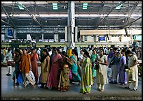 Women on train platform, Victoria Terminus. Mumbai, Maharashtra, India (color)