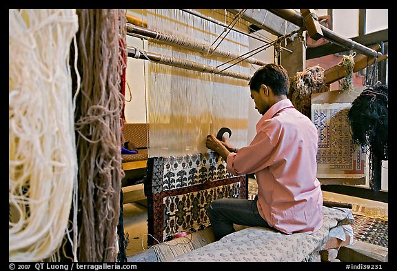 Man weaving a carpet. Agra, Uttar Pradesh, India (color)