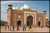Taj Mahal masjid with people strolling. Agra, Uttar Pradesh, India