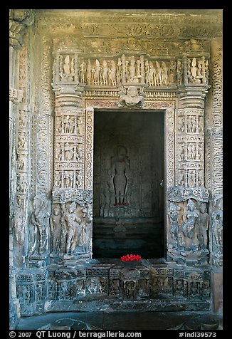 Inner sanctum with flowers and Vishnu image, Javari Temple, Eastern Group. Khajuraho, Madhya Pradesh, India