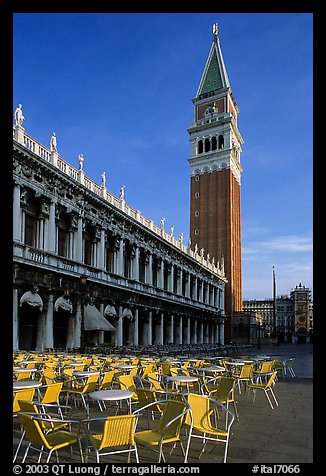Campanile, Zecca, and empty chairs, Piazza San Marco (Square Saint Mark), early morning. Venice, Veneto, Italy