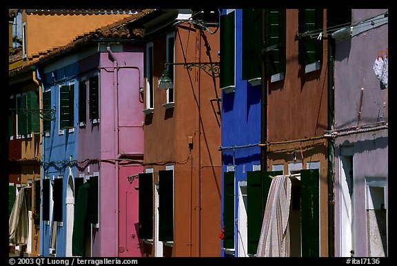 Facades of brightly painted houses, Burano. Venice, Veneto, Italy (color)