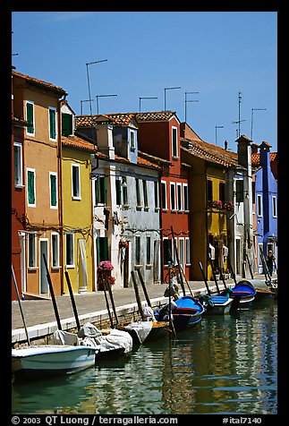 Canal lined with brightly painted houses, Burano. Venice, Veneto, Italy (color)
