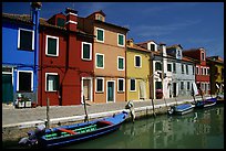 Canal bordered by colorfully painted houses, Burano. Venice, Veneto, Italy (color)