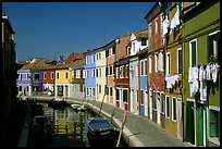 Canal lined with multihued houses, Burano. Venice, Veneto, Italy (color)