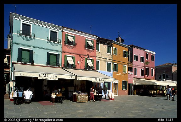 Street with brightly painted houses, Burano. Venice, Veneto, Italy (color)