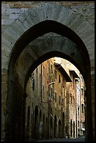 Arch and street. San Gimignano, Tuscany, Italy (color)