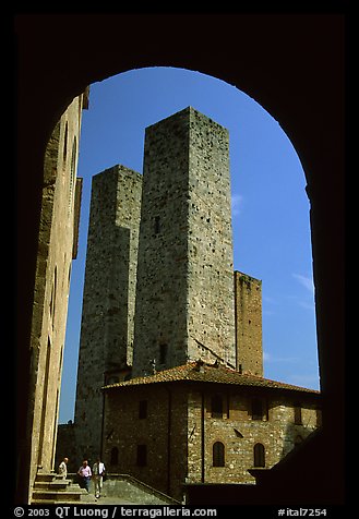 Medieval Towers framed by an arch. San Gimignano, Tuscany, Italy (color)