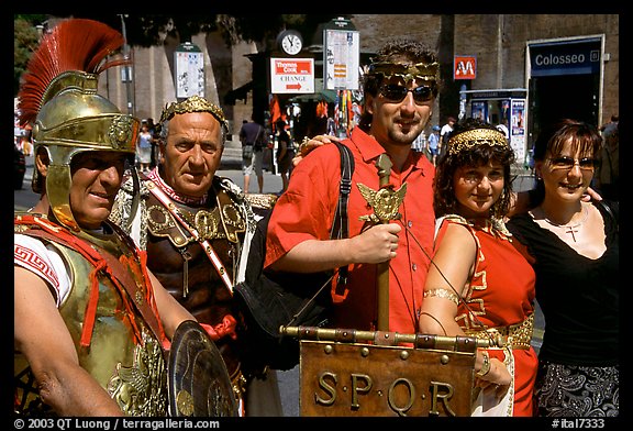 Roman Legionnaires pose with tourists, Roman Forum. Rome, Lazio, Italy