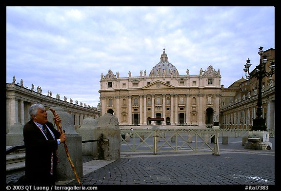 Pilgrim prays in front of the Basilic Saint Peter. Vatican City