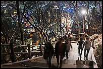People on Namsan stairs by night. Seoul, South Korea (color)