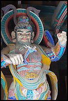 Painted statue with dragon, Bulguksa. Gyeongju, South Korea (color)