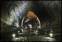 Manjanggul Lava cave with visitor standing. Jeju Island, South Korea