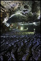 Hardened lava braids on floor of Geomunoreum. Jeju Island, South Korea