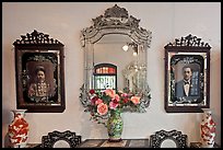 Portraits and mirors, Pinang Peranakan Mansion. George Town, Penang, Malaysia (color)