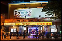 Movie theater showing Bollywood films at night. George Town, Penang, Malaysia