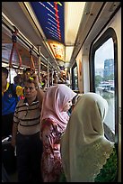 Inside Light Rail Transit (LRT) car. Kuala Lumpur, Malaysia (color)