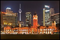 KL night skyline with Sultan Abdul Samad Building and Menara KL. Kuala Lumpur, Malaysia