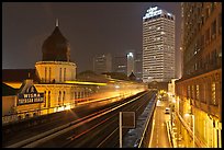 LRT train in motion at night. Kuala Lumpur, Malaysia