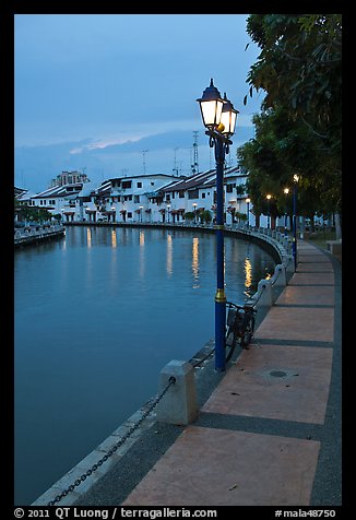 Melaka River river quay at dusk. Malacca City, Malaysia