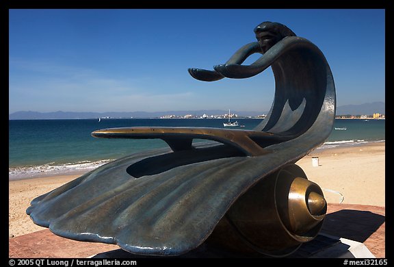 Sculpture by Bustamante on the seaside walkway with beach in the background, Puerto Vallarta, Jalisco. Jalisco, Mexico