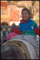 Girl riding a donkey. Guanajuato, Mexico