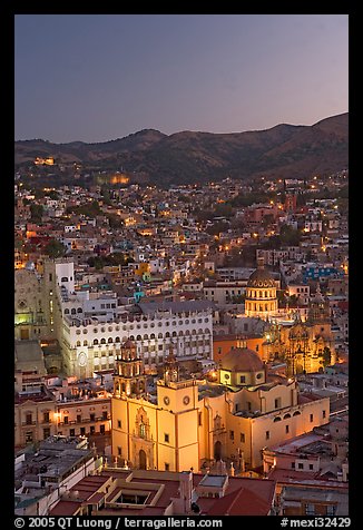 Panoramic view of the historic town with illuminated basilic, university, and La Compania. Guanajuato, Mexico