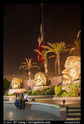 Family at Three Heads Park at night, Ensenada. Baja California, Mexico (color)