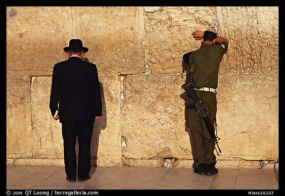 Orthodox Jew and soldier at the Western Wall. Jerusalem, Israel (color)