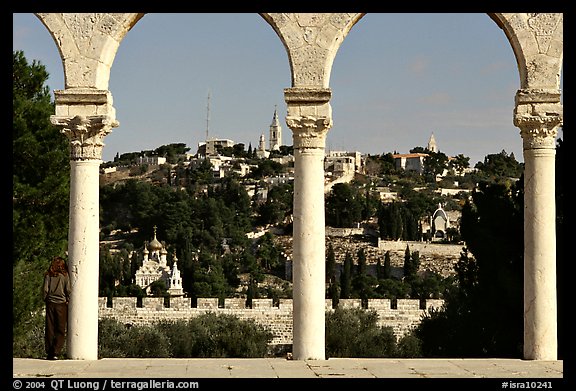 Spires and Mount of Olives seen through arches. Jerusalem, Israel (color)