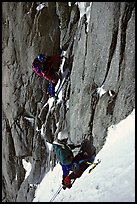 Climbers Frank and Alain start the Super-Couloir on Mt Blanc du Tacul, Mont-Blanc Range, Alps, France. (color)