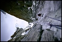 Climbers Frank and Alain climb thin ice in the Super-Couloir on Mt Blanc du Tacul, Mont-Blanc Range, Alps, France.