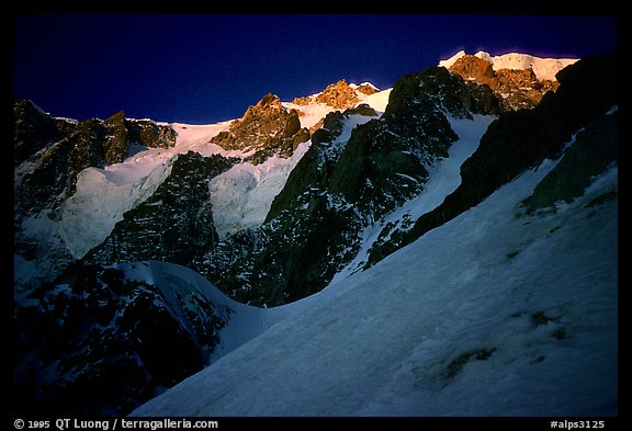 Looking up from the Red Sentinel route at dawn, Mont-Blanc, Italy.